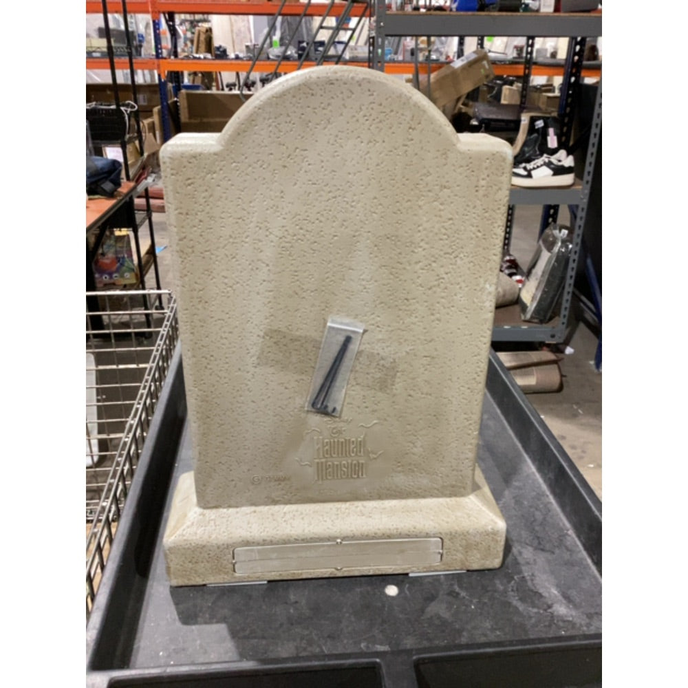 Lot # 1456 Disney 2-ft Disney The Haunted Mansion Blow Mold Tombstone $60