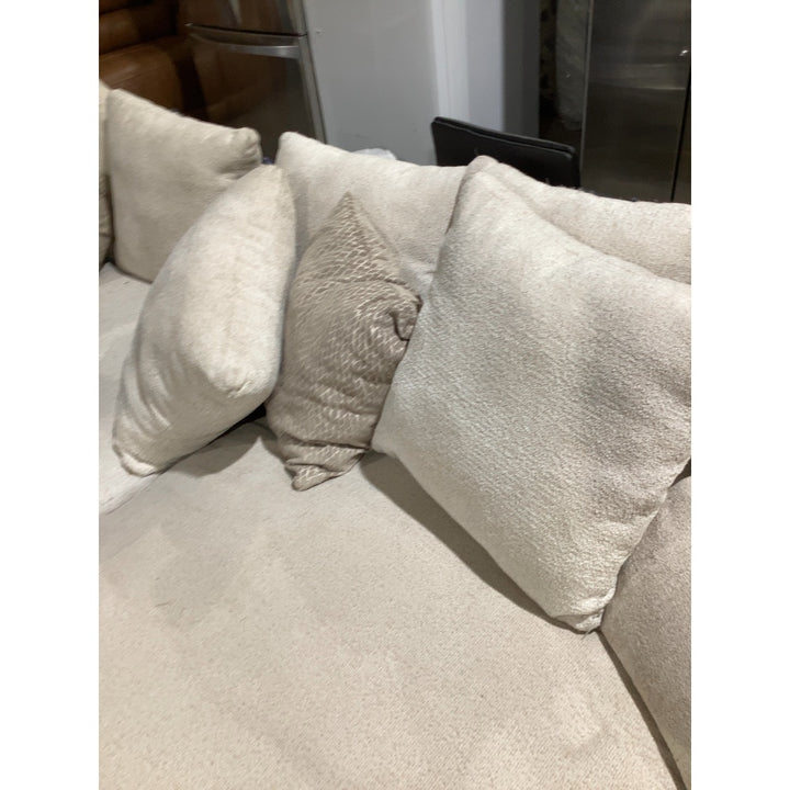 Lot # 2307 Beige Model Beige Cushioned Sofa $800