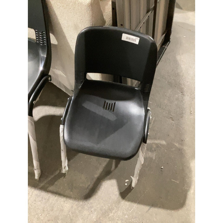 Lot # 2344 Black stackable chair for offices or waiting rooms.