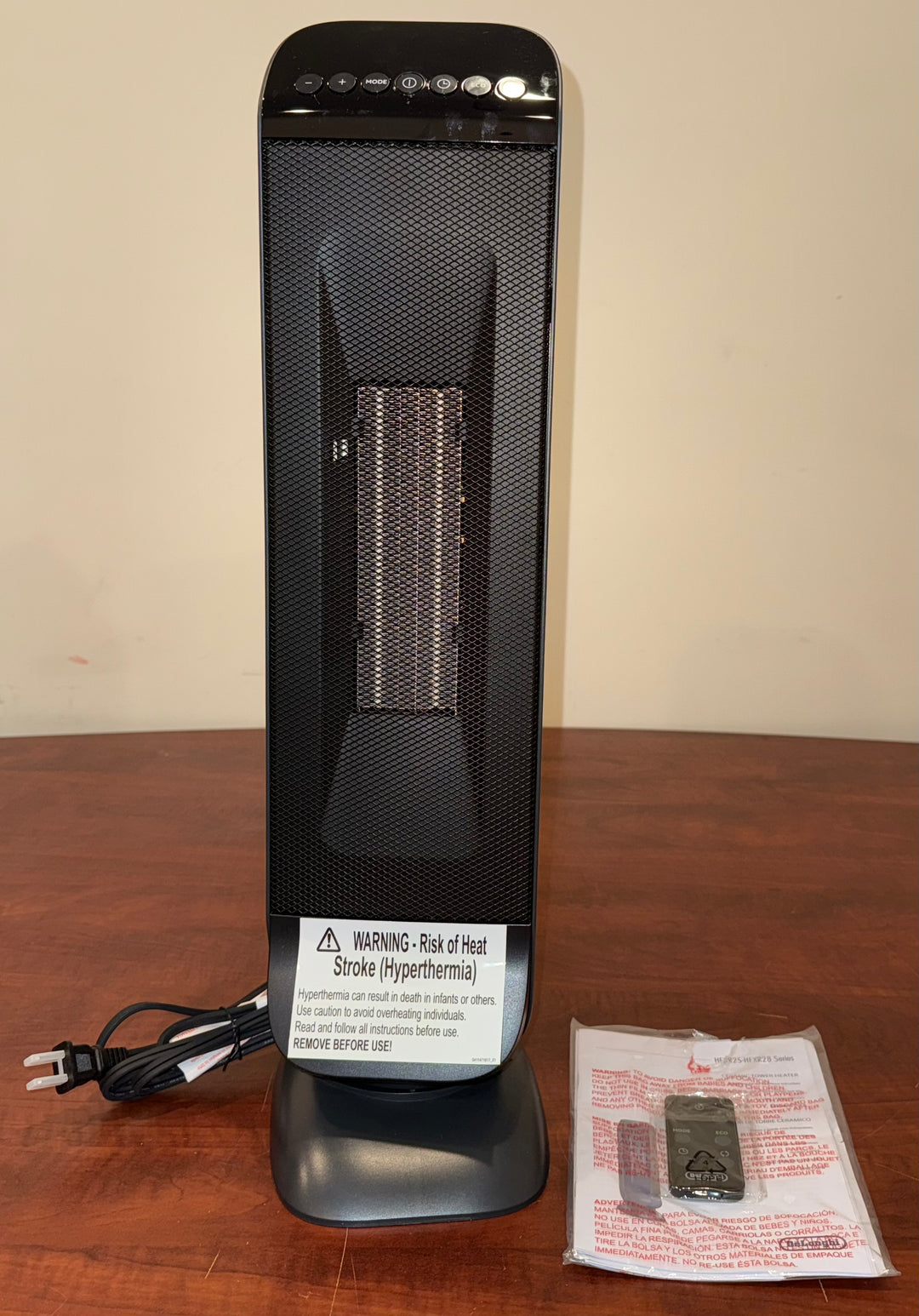 DeLonghi Up to 1500-Watt Ceramic Tower Indoor Electric Space Heater with Thermostat and Remote Included
