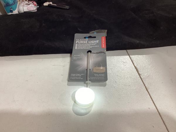 Lot # 803 Kikkerland Silicone Purse Light, White