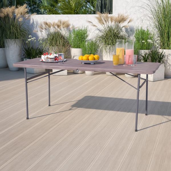 Lot # 1646  6-Foot Brown Wood Plastic Folding Table $115