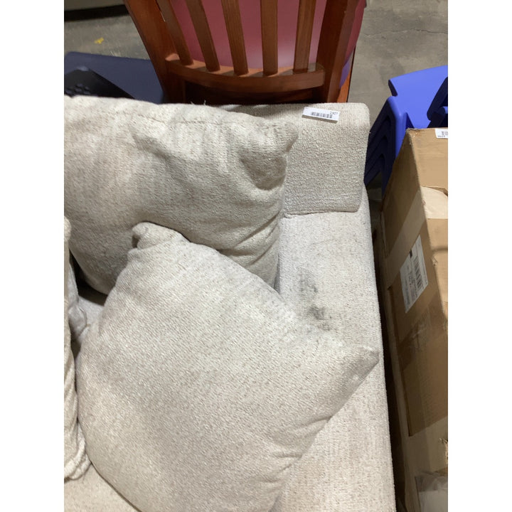 Lot # 2307 Beige Model Beige Cushioned Sofa $800