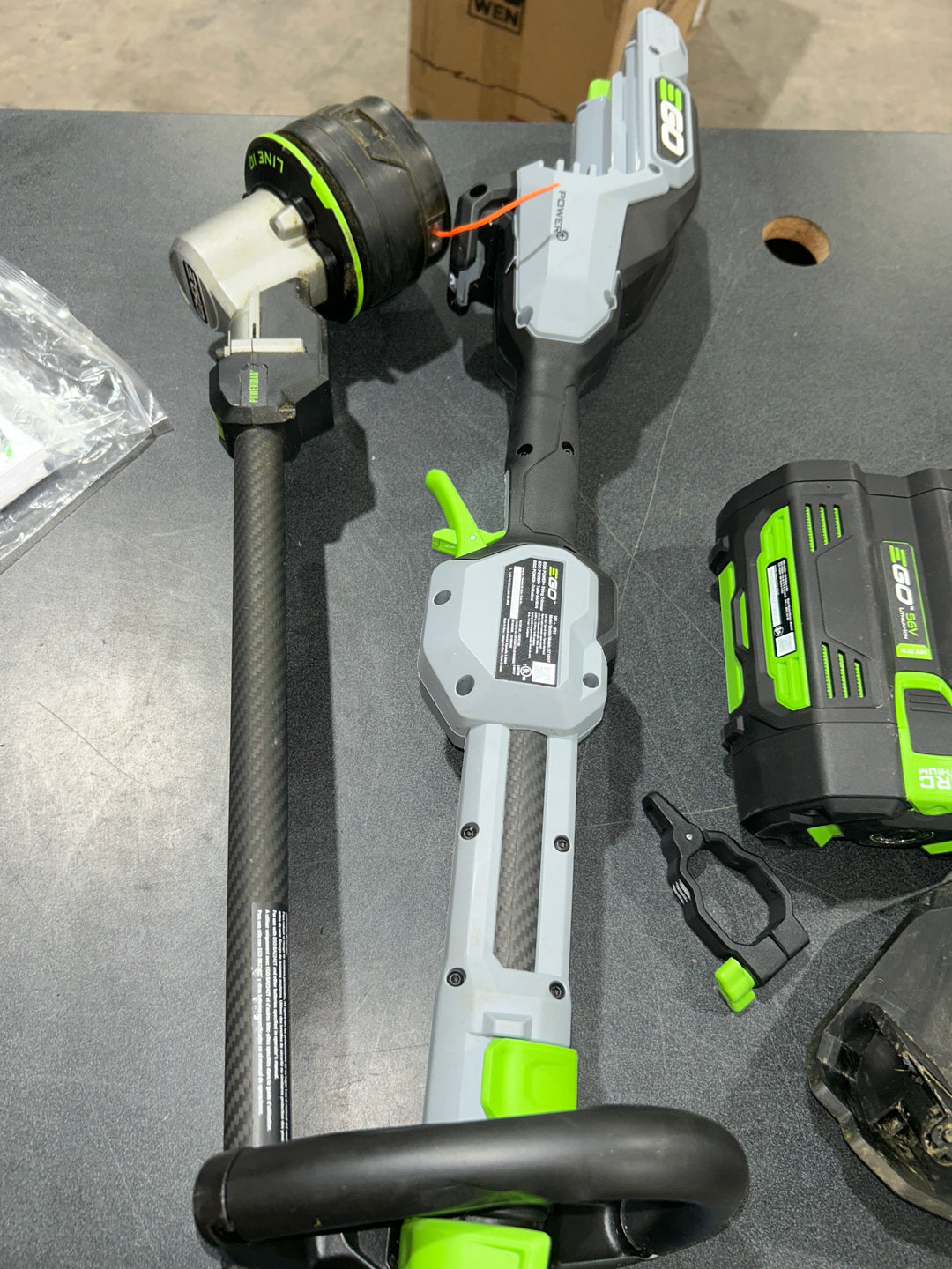 EGO POWER + POWERLOAD with LINE IQ 56-volt 16-in Telescopic Shaft Battery String Trimmer 4 Ah (Battery and Charger Included)(used)