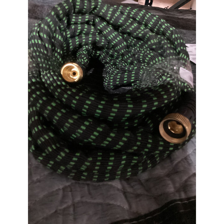 Lot # 1023 Generic Expandable Garden Hose, Flexible, Brass Fittings, Black with Green Stripes