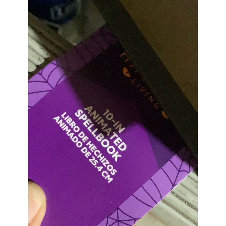 Lot # 837 Living Animated Spellbook $40.00