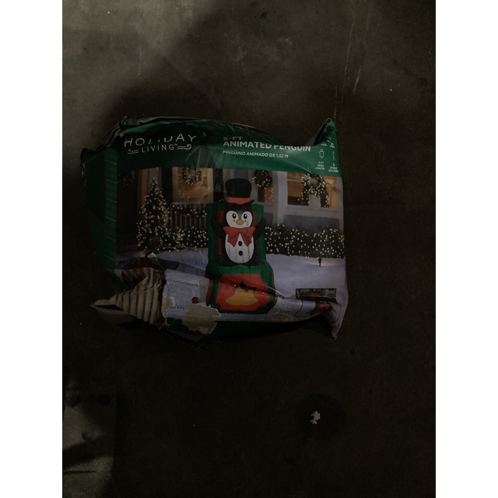 Lot # 1034 Holiday Living 5-ft Animated Penguin Inflatable $69.00