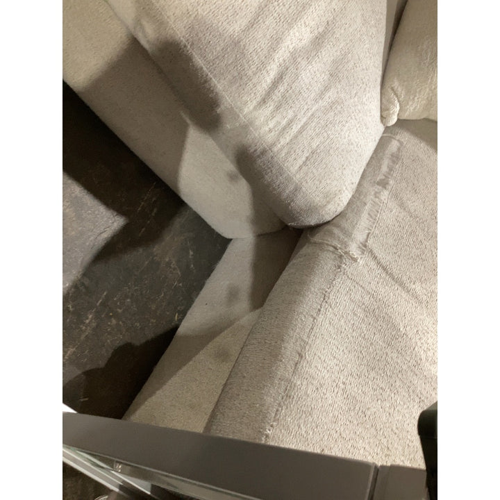 Lot # 2307 Beige Model Beige Cushioned Sofa $800