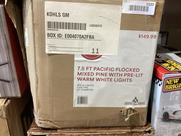 Lot # 1520 7.5ft pacific flocked mixed pine with warm lights $150