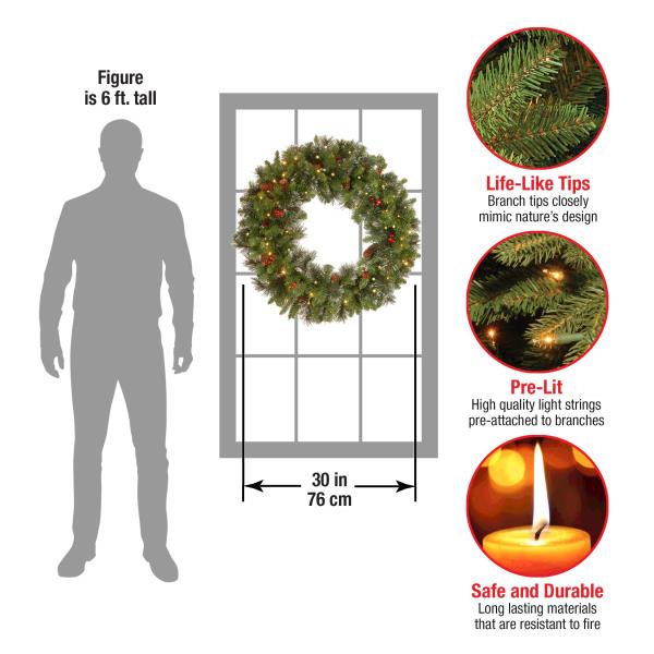 Lot # 1598 National Tree Company Pre-Lit Artificial Christmas Wreath, Green, Carolina Pine, White Lights, Decorated with Pine Cones and Glitter, Berry Clusters, Christmas Collection, 30 Inches