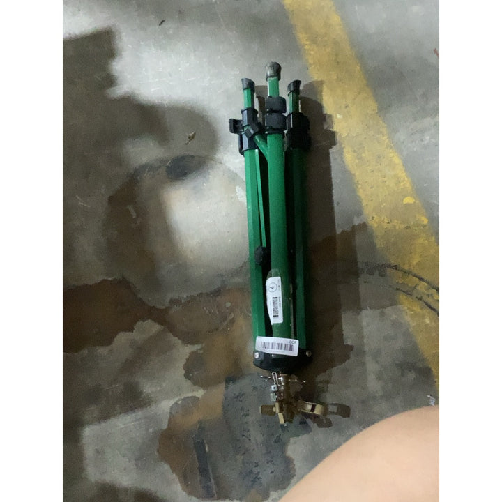 Lot # 808 Estimated Green Sprinkler Tripod $25.00
