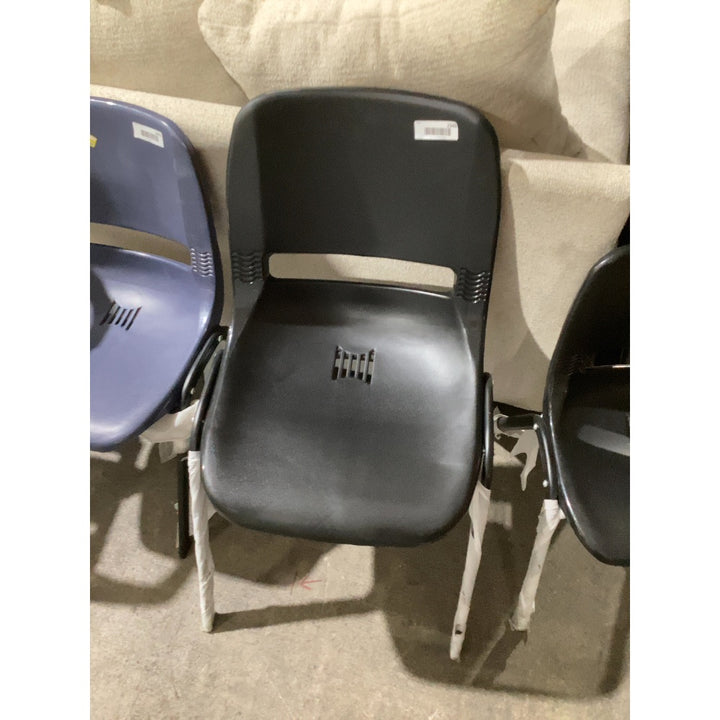 Lot # 2343 Black  Black stackable chair great for officeswaiting rooms.