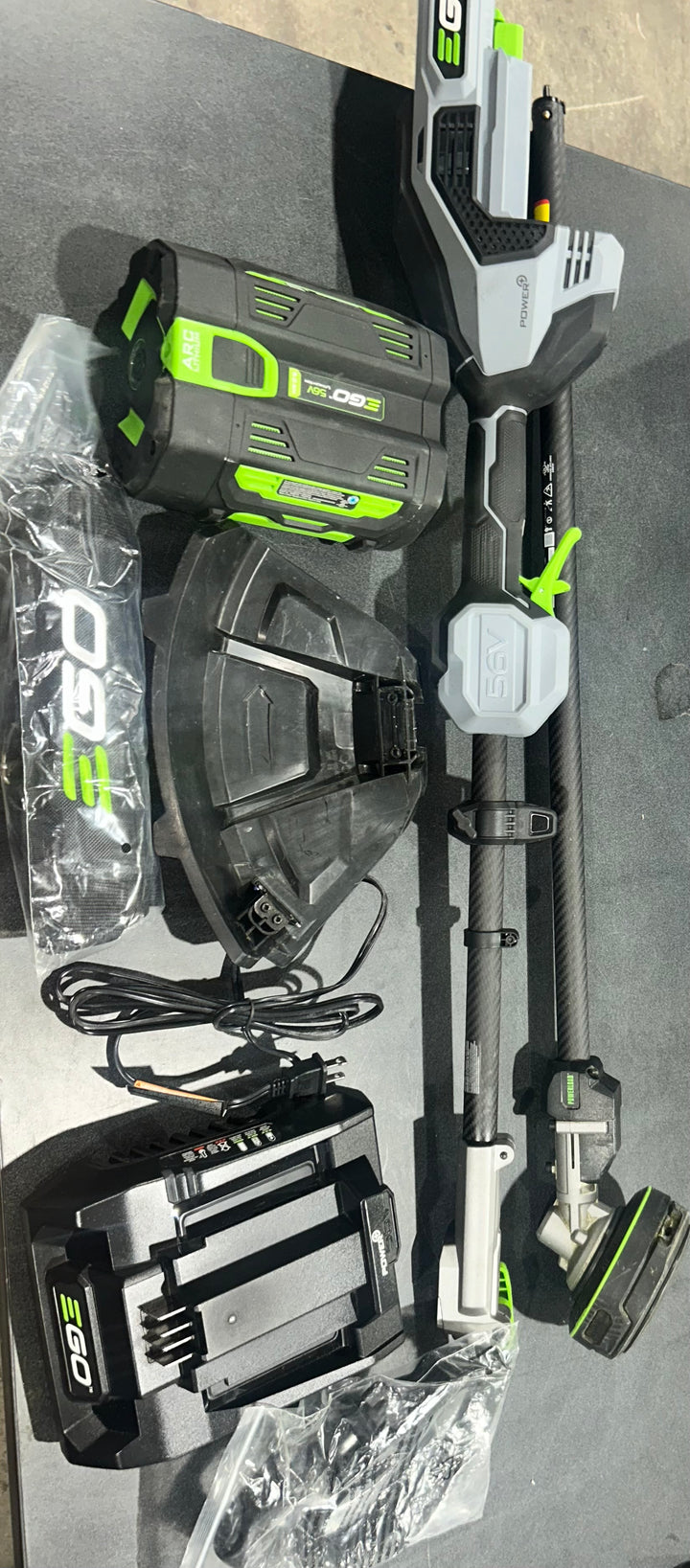 EGO POWER+ Multi-Head System with LINE IQ, POWERLOAD 56-volt 17-in Straight Shaft Attachment Capable Battery String Trimmer 5 Ah (Battery Included) (Charger Included)(used)