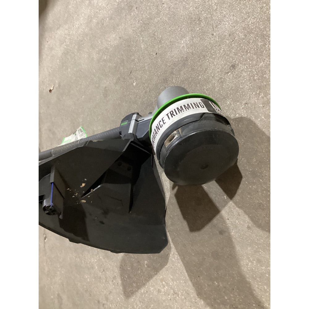 Lot # 1271 EGO POWER+ ST1620T 56V Cordless String Trimmer - 16 inch Cutting Width, Performance Trimming, Green/Gray