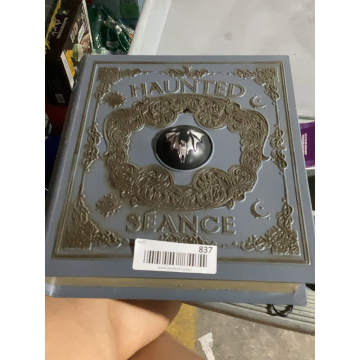 Lot # 837 Living Animated Spellbook $40.00