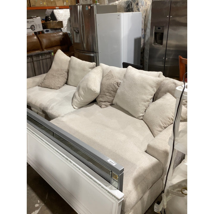 Lot # 2307 Beige Model Beige Cushioned Sofa $800