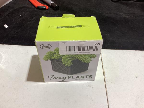 Lot # 226 Fred Fancy Plants Planter, Black