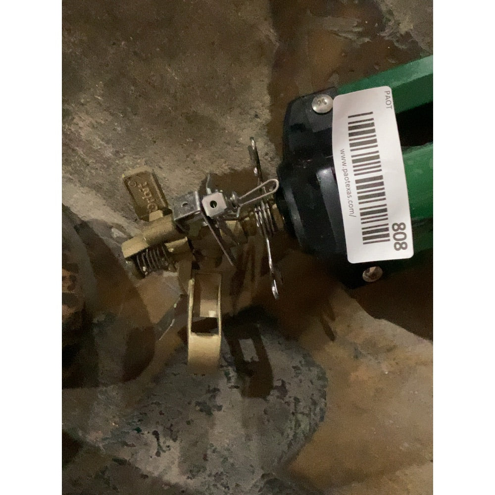 Lot # 808 Estimated Green Sprinkler Tripod $25.00