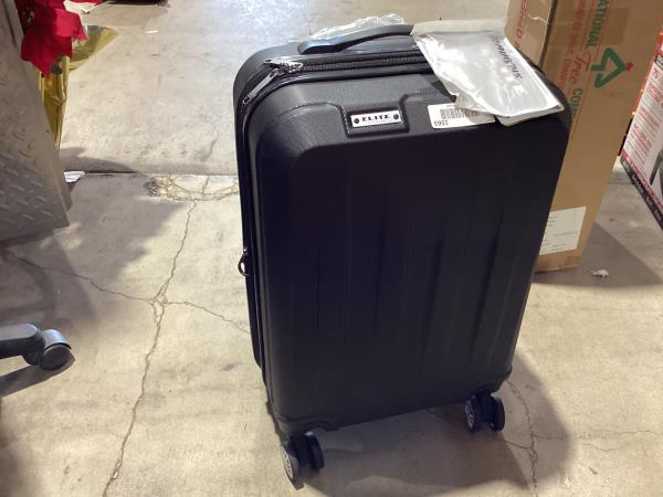 Lot # 1563 dori 21in black suitcase $70