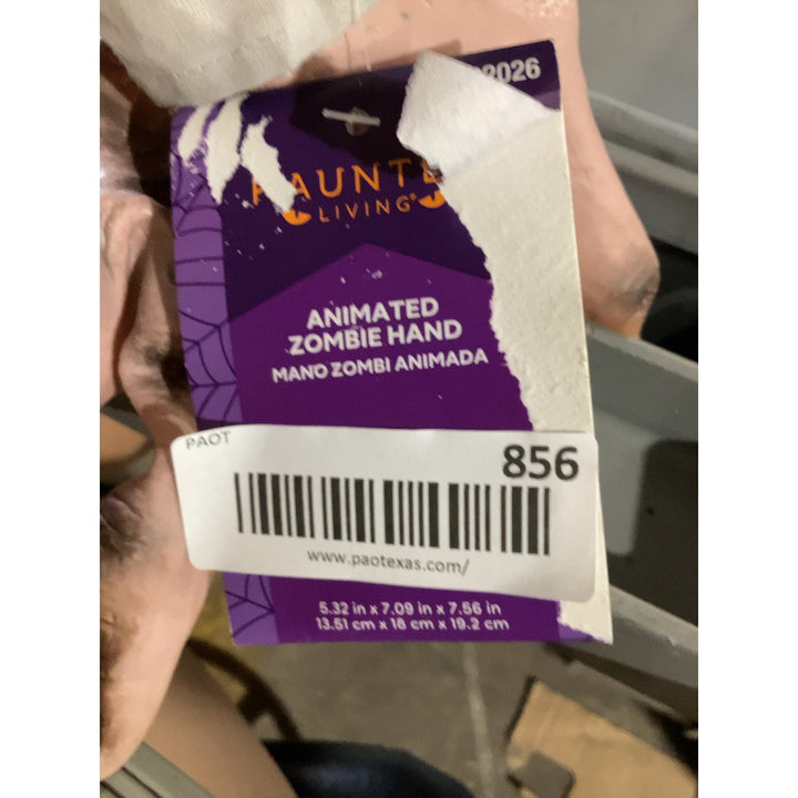 Lot # 856 Haunted Living Animated Zombie Hand $25.00