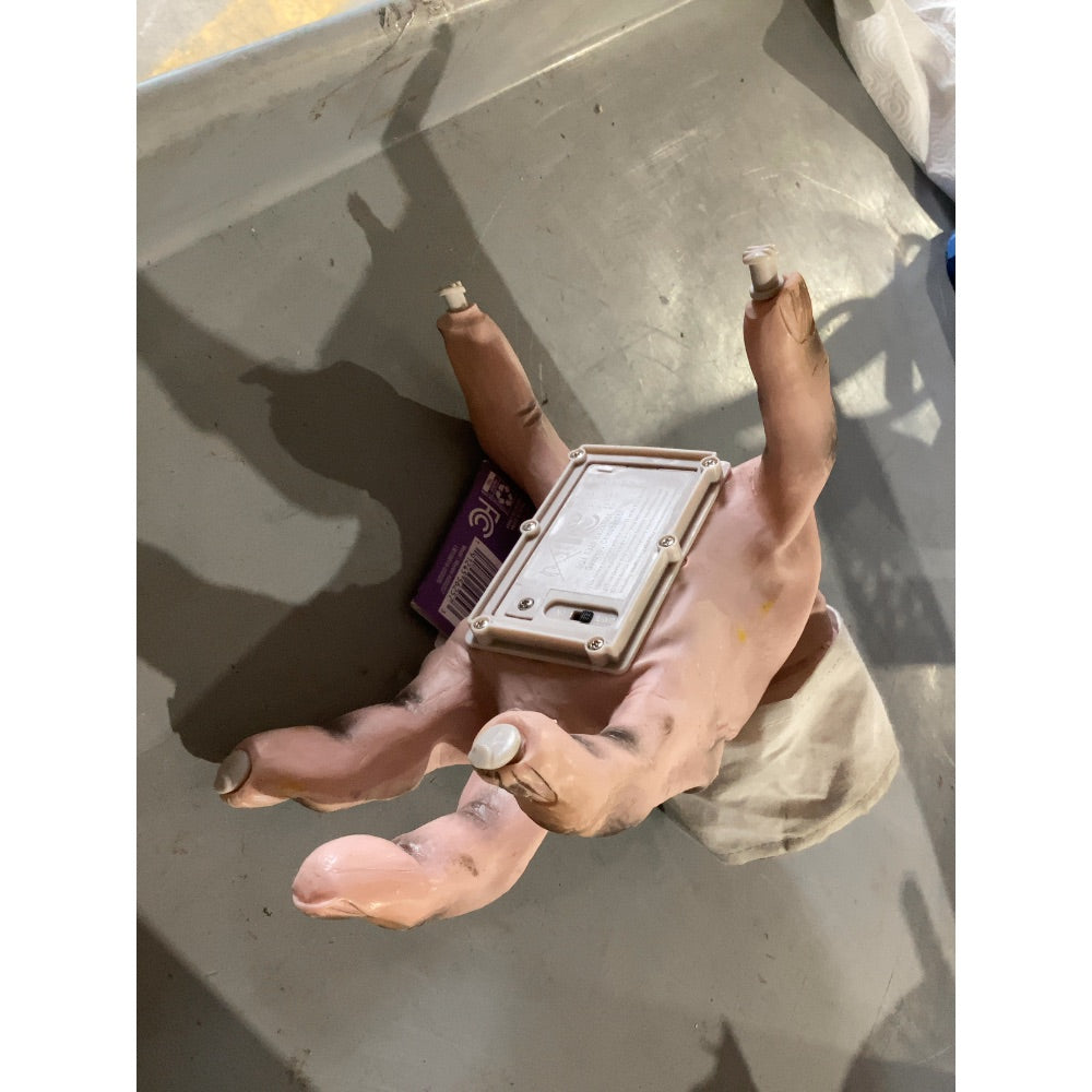Lot # 856 Haunted Living Animated Zombie Hand $25.00