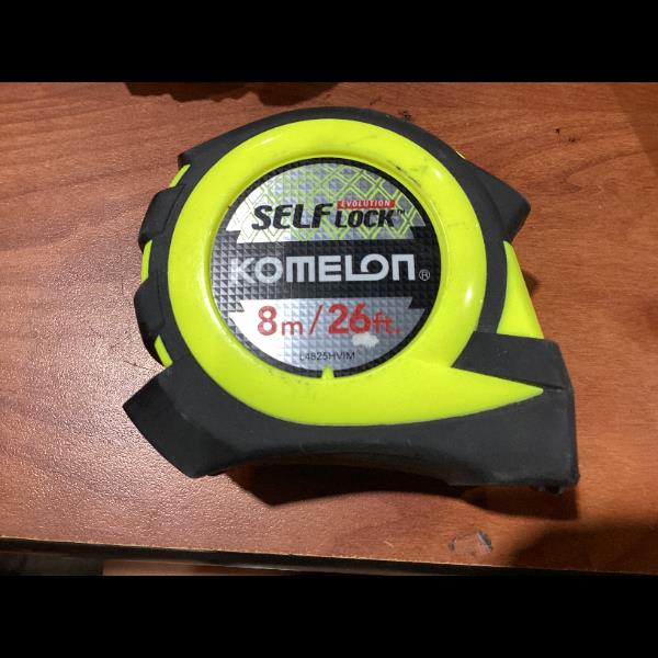 Lot # 11 Komelon Self Lock Evolution Tape Measure $15