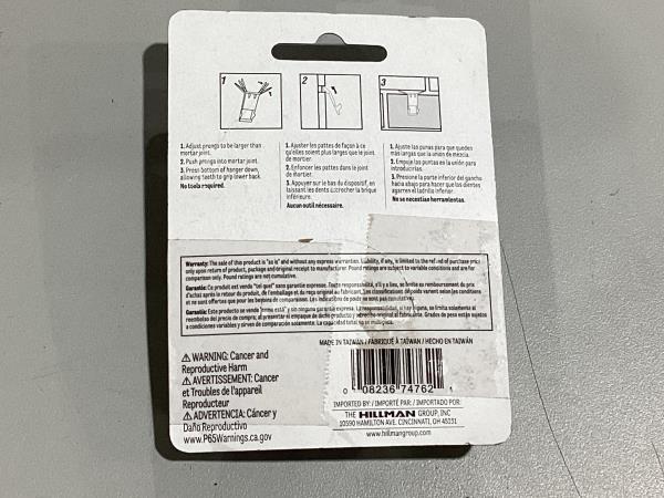 Lot # 570 Brick Block Picture Hanger $9.55